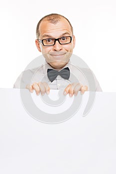 Smiling business man with white info board