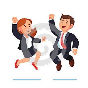 Smiling business man and woman jumping together