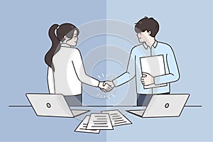 Smiling business partners handshake closing deal at meeting