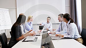 Smiling business people meeting in office