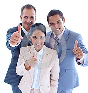 Smiling business team with thumbs up