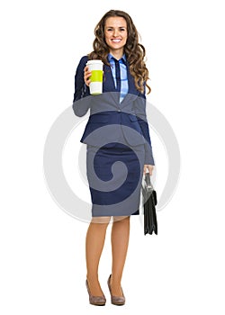 Smiling business woman with briefcase and cofee cup