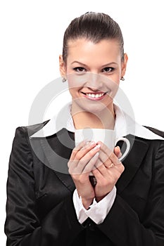 Smiling business woman drink cofee