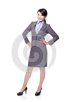 Smiling business woman full length