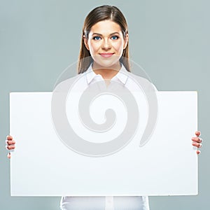 Smiling business woman hold big white blank sign board.