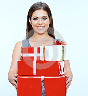 Smiling business woman hold pile of gifts. Red gift box.