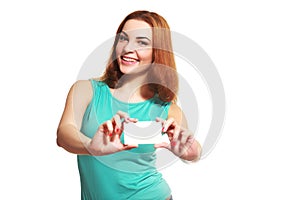 Smiling business woman holding card