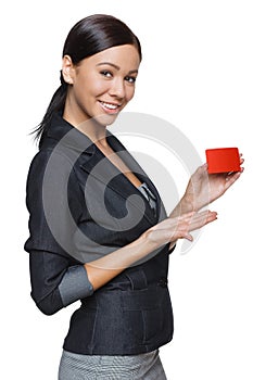 Smiling business woman holding credit card