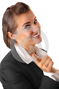 Smiling business woman pointing finger at you