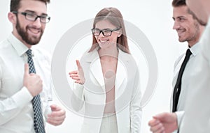 Smiling business woman pointing to employee
