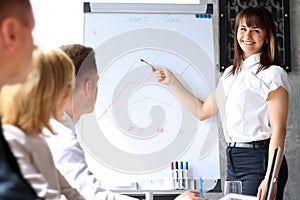 Smiling business woman presenting. Presentation on a background