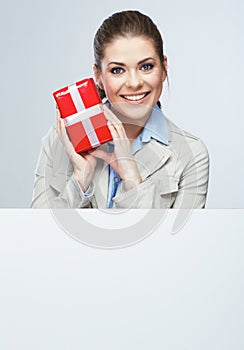 Smiling business woman red gift box hold.