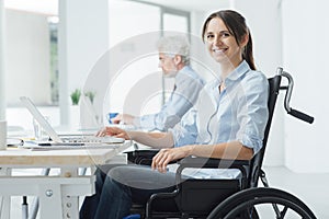 Smiling business woman in wheelchair photo