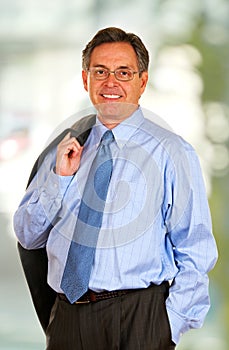 Smiling Businessman With Bokeh Background