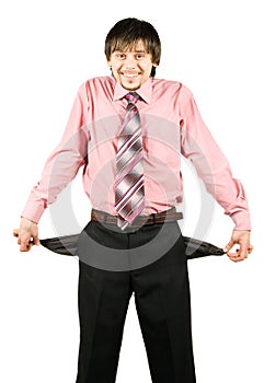 Smiling businessman with empty pockets