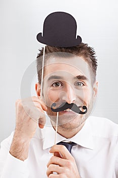Smiling Businessman with Funny Mask
