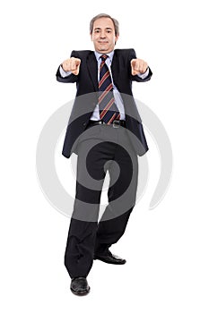 Smiling Businessman with hands pointing