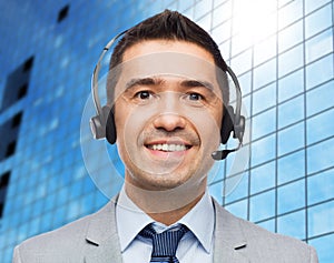 Smiling businessman in headset