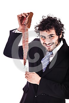 Smiling businessman lighting chained firecrackers