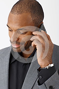 Smiling businessman on phone call