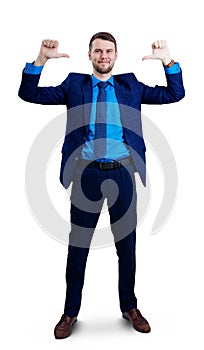 Smiling businessman pointing on himself by thumbs up gesture.
