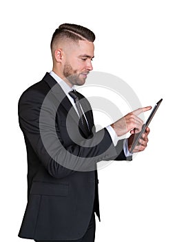 Businessman with tablet in hands, isolated over white background