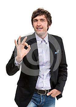 Smiling businessman showing ok sign