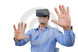Smiling businessman sitting chair while wearing vr glasses