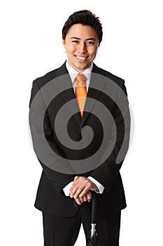 Smiling businessman with umbrella