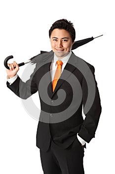 Smiling businessman with umbrella