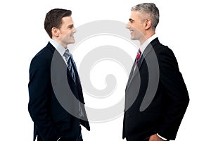 Smiling businessmen in discussion