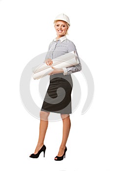 Smiling businesswoman architect holding blueprints