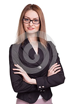 Smiling businesswoman with arm folded wearing glasses isolated