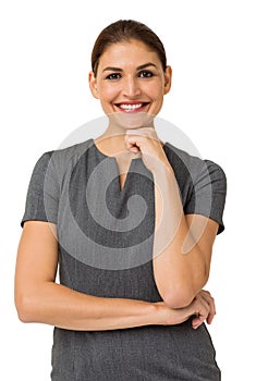 Smiling Businesswoman With Hand On Chin