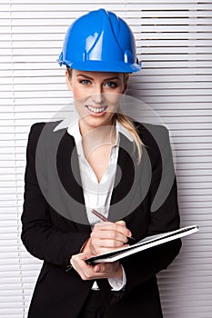 Smiling Businesswoman in Hard Hat