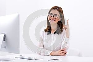 Smiling businesswoman having idea