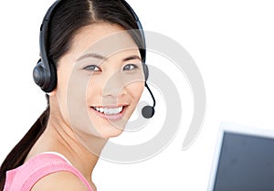 Smiling businesswoman with headset on