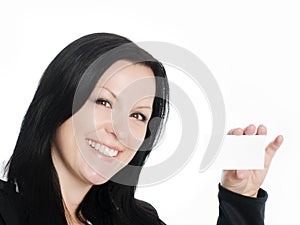 Smiling businesswoman holding businesscar