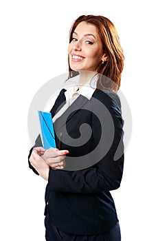 Smiling businesswoman holding notebook and pen