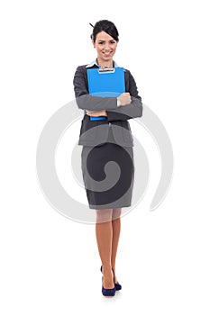 Smiling businesswoman with notepad