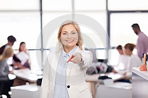 Smiling businesswoman at office
