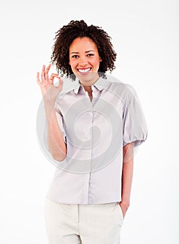 Smiling businesswoman showing okay sign