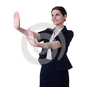 Smiling businesswoman standing over white isolated background