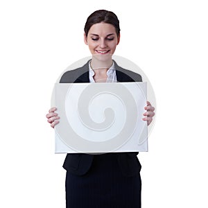 Smiling businesswoman standing over white isolated background