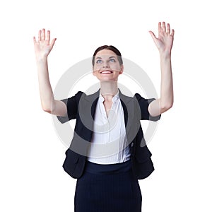 Smiling businesswoman standing over white isolated background