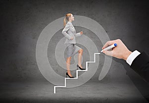 Smiling businesswoman stepping up staircase