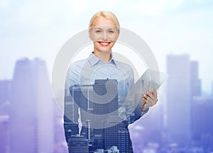 Smiling businesswoman with tablet pc computer