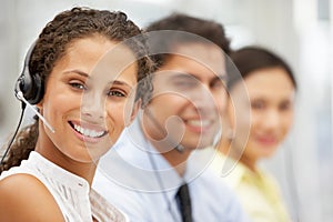 Smiling businesswoman wearing headset