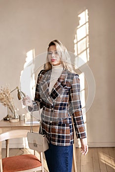 Smiling busy girl standing in home office