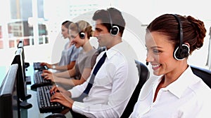 Smiling call centre agents with headset